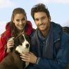 Trekkers with dog taking rest