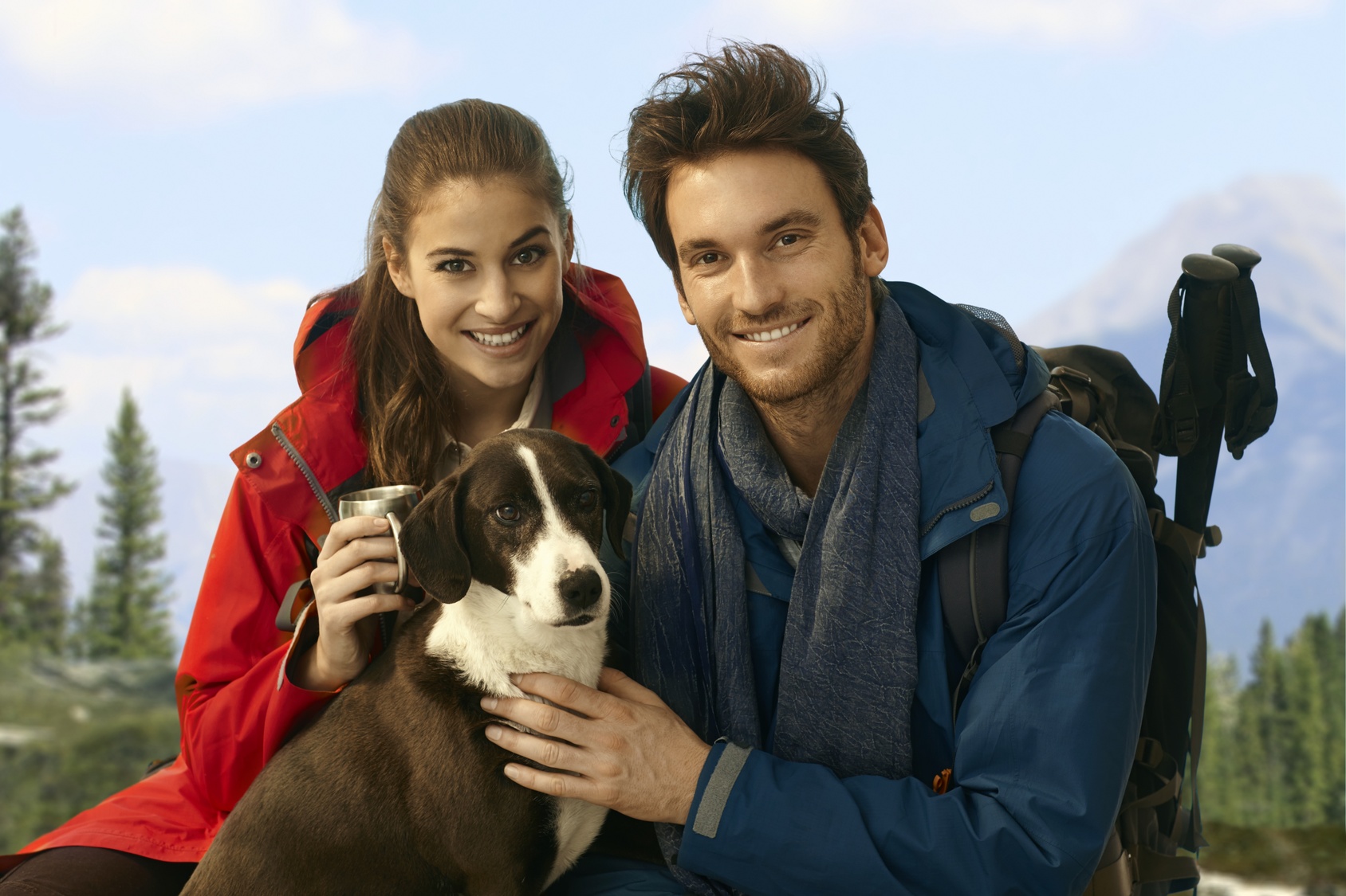 Trekkers with dog taking rest