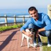 young man with his pet dog