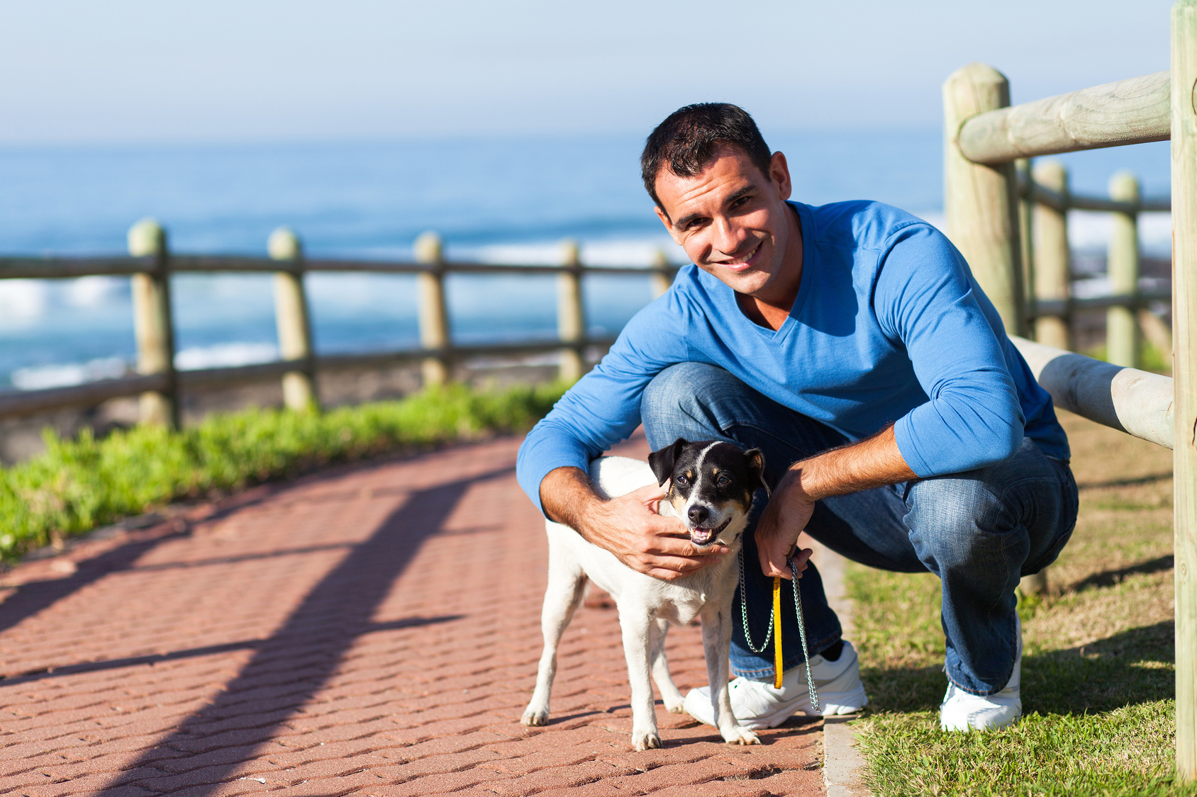 young man with his pet dog
