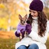 Cute woman with her Miniature Pinscher