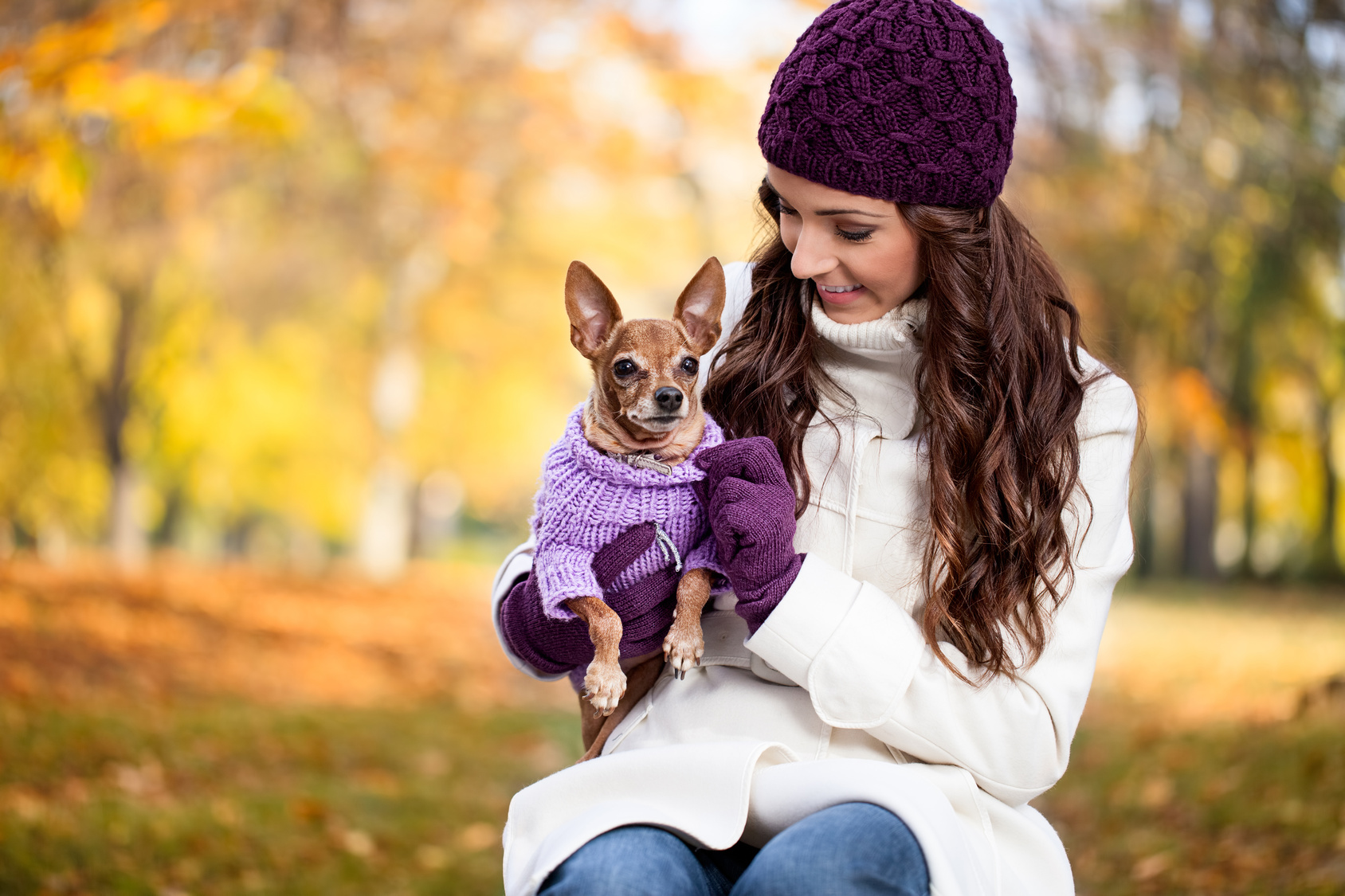 Cute woman with her Miniature Pinscher
