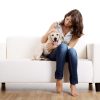 Woman with golden puppy