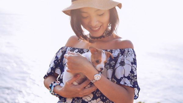 Woman holding puppy