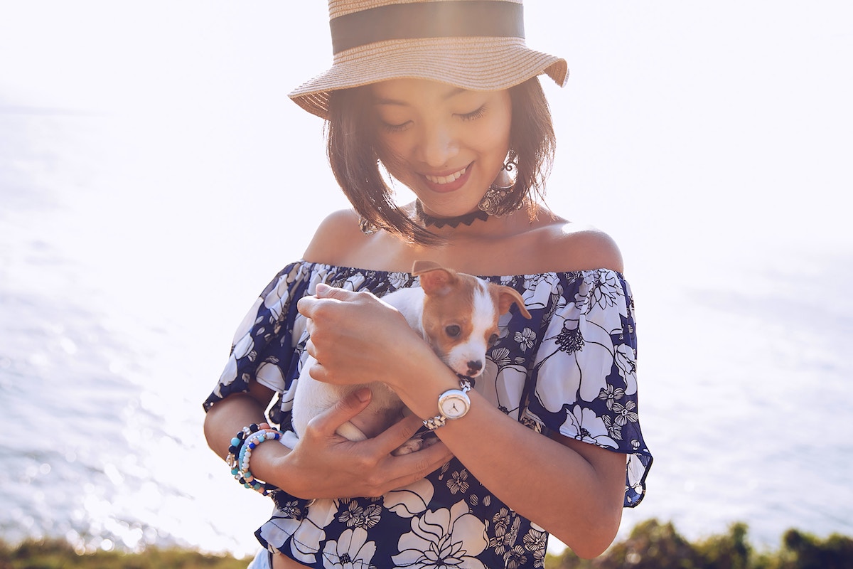 Woman holding puppy